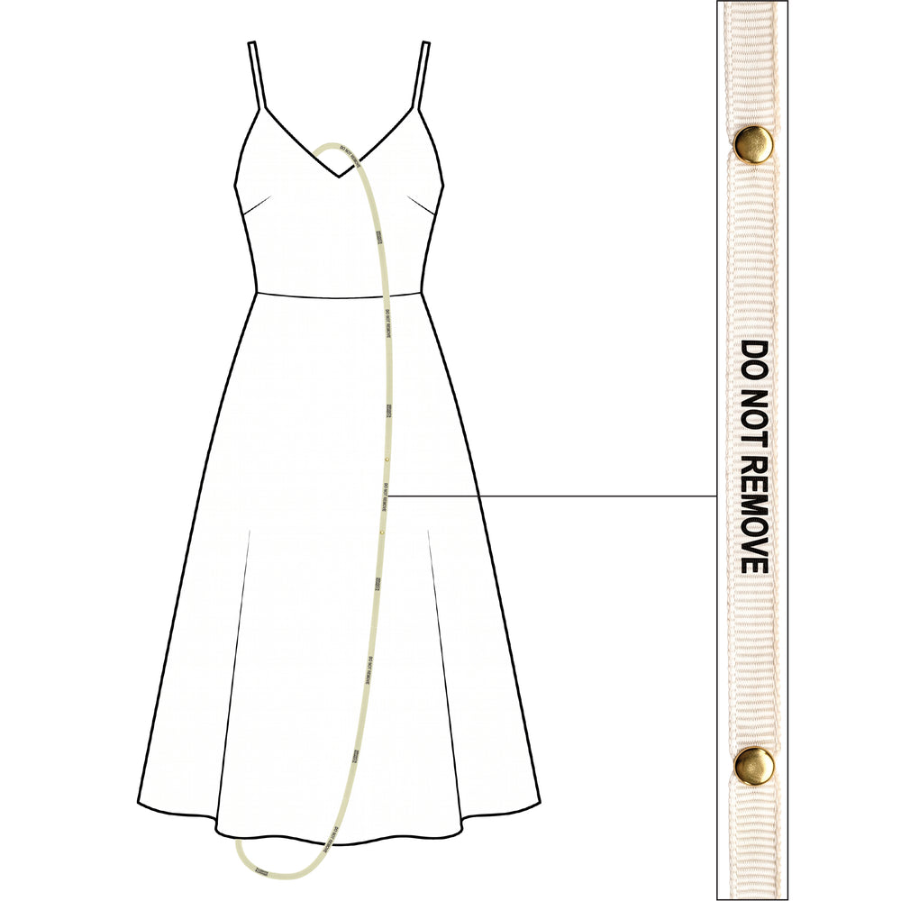 Do Not Remove ribbon threaded through a slip dress, with a close-up of the ribbon
